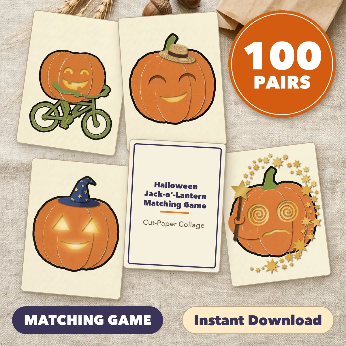 Four jack-o'-lantern cards fanned around a title card on a light table, under a round badge reading 100 PAIRS, with the labels Print and Cut and Instant Download.
