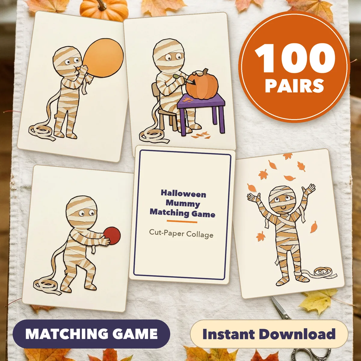 Four mummy cards fanned around a title card on a light table, under a round badge reading 100 PAIRS, with the labels Print and Cut and Instant Download.